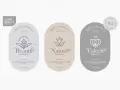 Trzy eleganckie etykiety produktów organicznych: "Beauty", "Nature" i "Valera". Każda zawiera listę składników (skład inci) i logo.